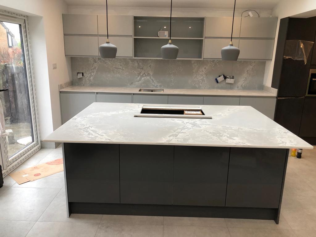 Different finished kitchen with island and storage — Suddeco Homes project archive